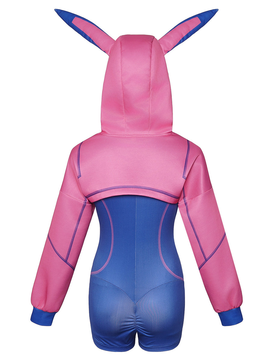 Back view of Cyber Bunny Heroine cosplay showing the form-fitting blue romper and the standing bunny ears on a pink hooded shrug.